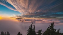 Magic sunset colorful sky above foggy clouds heaven nature landscape in autumn alps forest mountains Time lapse 4K
