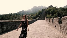 woman walking on the Great Wall of China 