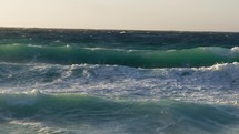 Big ocean waves crashes on shore