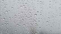 rain water droplets on glass 