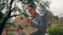 Business Man Read The Newspaper