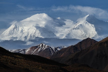 snow capped mountains and layers of a mountain landscape 