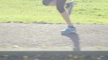 legs of a man running 
