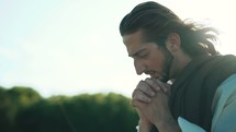 Jesus praying outdoors 