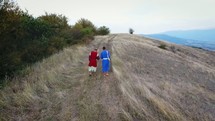 apostles hiking up a mountaintop 