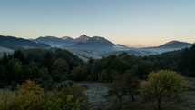 Morning light of sunrise in mountains landscape Time-lapse
