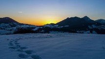 Blue sunrise over alpine mountains in sunny winter landscape, Nature Time lapse

