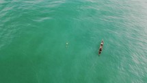 Drone Shot Of Fisheraman On A Canoe