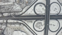 Car traffic on highway junction in winter city