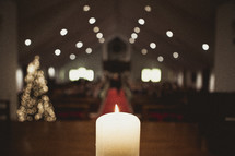Burning candle at wedding ceremony