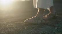 feet of Jesus walking 