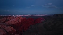Red Rock canyon at night with Las Vegas in the background