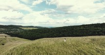 A girl in the plains, captured by the drone