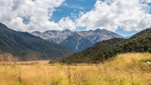 Beautiful sunny day in alps mountains landscape in wild nature of New Zealand time-lapse
