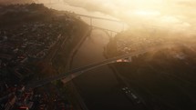 Aerial view of traffic on the bridge at sunrise