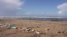 Mess of garbage plastic waste washed up on a beach in Morocco Polluted Environment nature