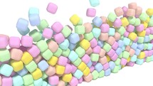 Soft color sweets candy confection falls on white surface