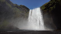 Waterfall In Iceland. Amazing View Of The Skogafoss Waterfall