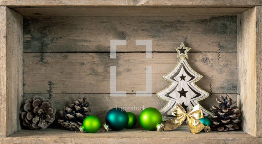 Christmas decorations in a wooden crate 