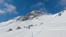 Ski touring in backcountry alps mountain nature in beautiful sunny day, Panoramic view
