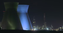 Large scale oil refinery during night with many lights