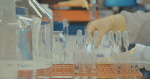 Scientist working in a pharmaceutical laboratory conducting experiments