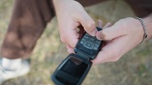 Young Man Sends Messages On A Vintage Button Telephone