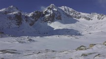 Panorama of snowy winter alps mountains nature in beautiful sunny day
