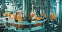 Machines in an automated chemical bottles production line