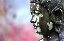 Chipped Japanese statue