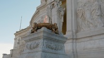 The flame of glory burning under a statue in Rome 