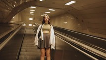 Woman on an escalator