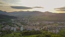 Aerial sunset over city Time-lapse
