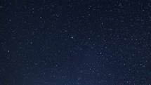 Night sky astronomy background with millions stars in dark Starry space Time lapse