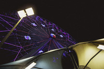 A large ferris wheel at night