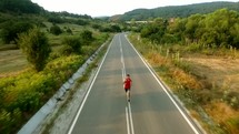 a man running on a road 
