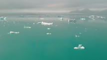 icebergs floating in the ocean 
