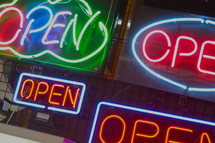 neon "open" signs