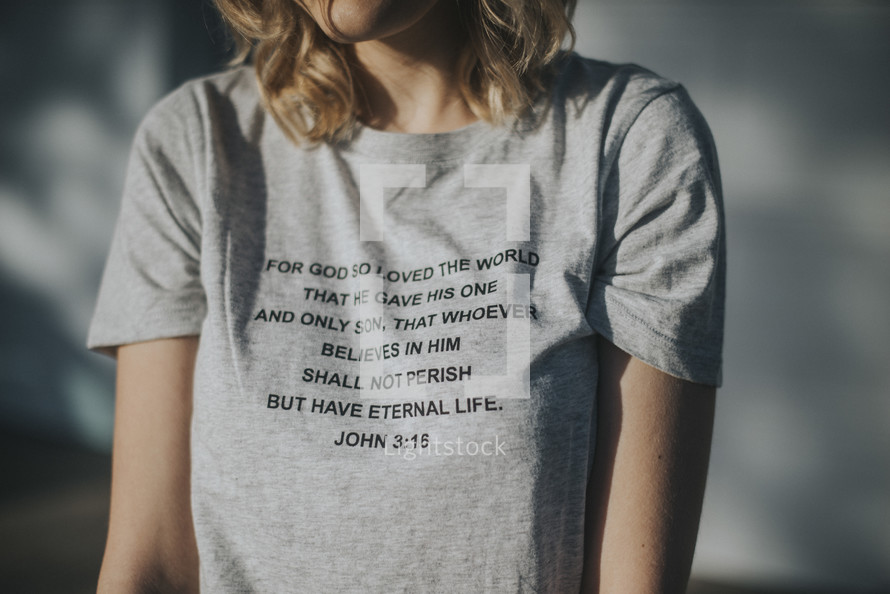 woman wearing a John 3:16 t-shirt 