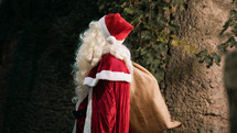 Santa Claus looking for next house to reach