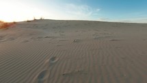 Sand dunes under a blue sky