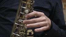 a man playing a saxophone 
