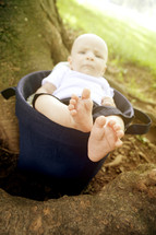 Baby boy in bucket