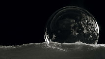 Bubble forming ice crystals in snow.

