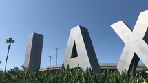 The famous LAX airport sign at Los Angeles International Airport slow pan.