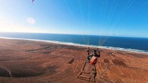 Paragliding flying freedom adventure in Morocco Ocean coast in Nigel's Place, Adrenaline extreme sport

