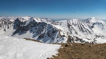Panoramic view of snowy alps mountains in beautiful sunny winter.
