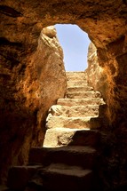 steps out of a tomb
