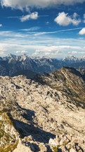 Vertical Panorama of sunny mountains nature in Julian alps, Slovenia summer holiday Time lapse
