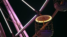 lights on a spinning ferris wheel 